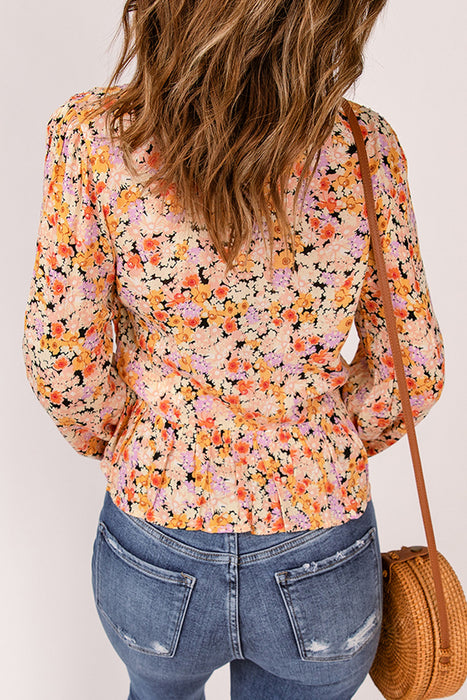 Floral Buttoned Plunge Peplum Blouse